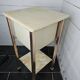 Bedside table in patinated iron, brass and marble tops