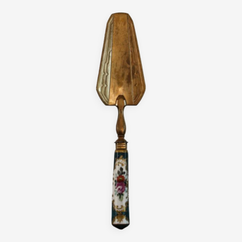 Brass pie shovel, porcelain handle