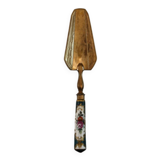 Brass pie shovel, porcelain handle