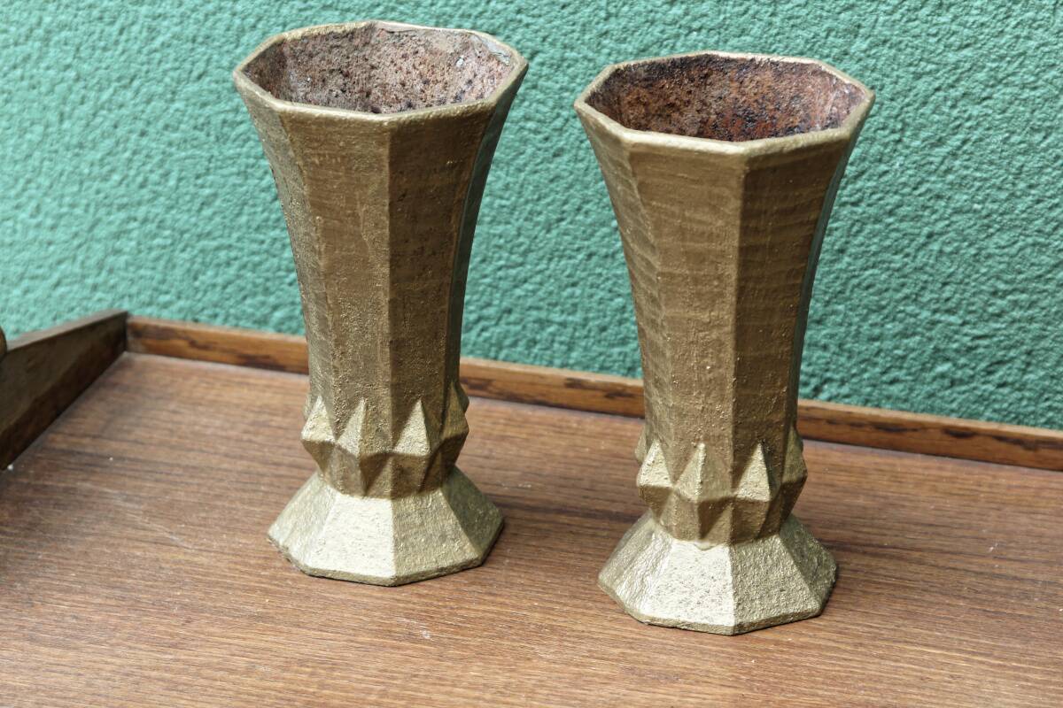 Pair of cast iron cone vases, art deco