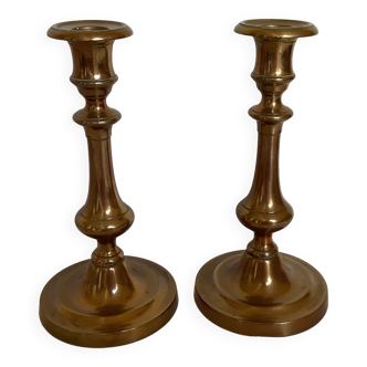 Pair of old brass candle holders