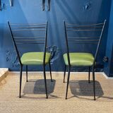 Pair of green vinyl chairs with black steel legs by Colette Gueden