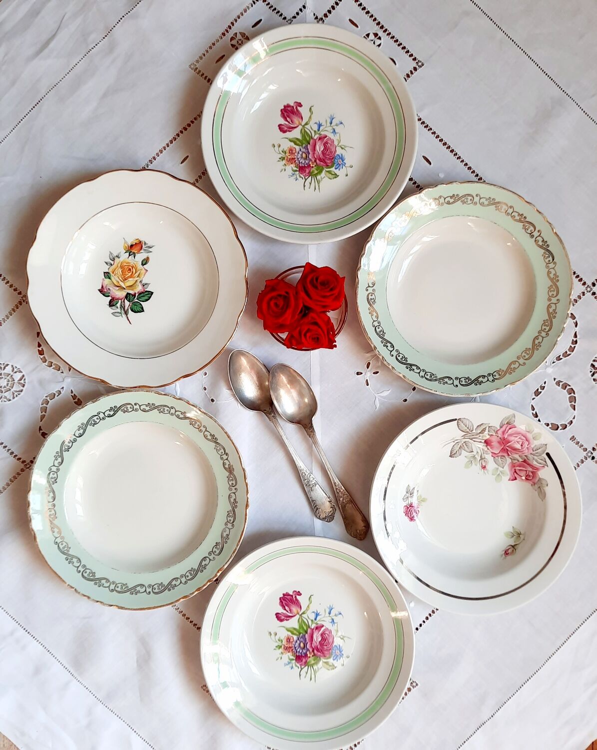 Old hollow plates mismatched in earthenware