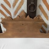 Old sandblasted wooden pediment