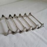 6 Silver metal knife holders