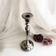 Chromed metal candle holder