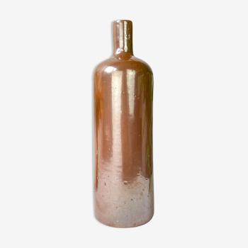 Vintage iridescent brown sandstone bottle