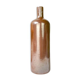 Vintage iridescent brown sandstone bottle