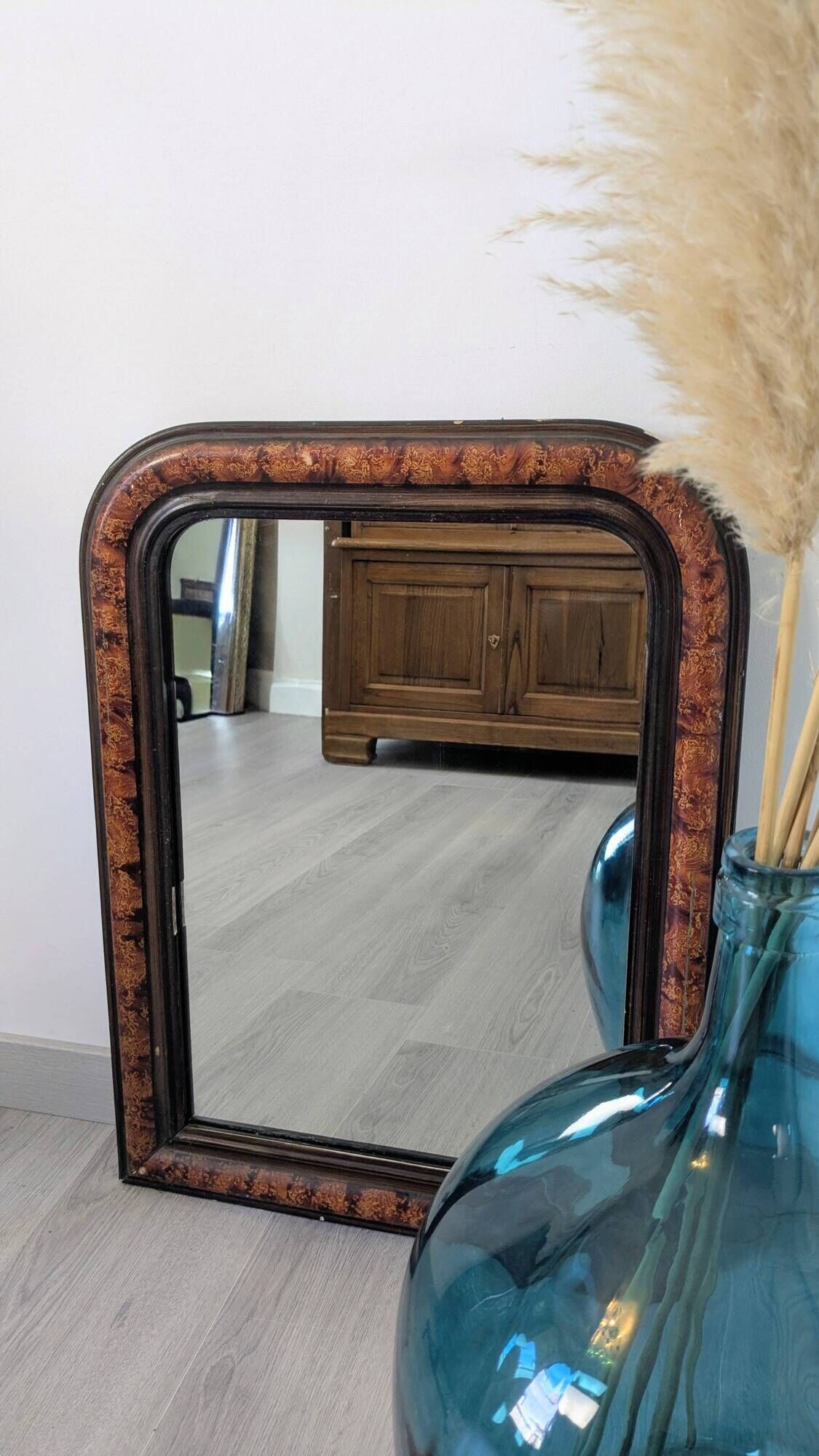 Antique Louis-Philippe mirror in blackened wood with a burl effect – 67x52 cm