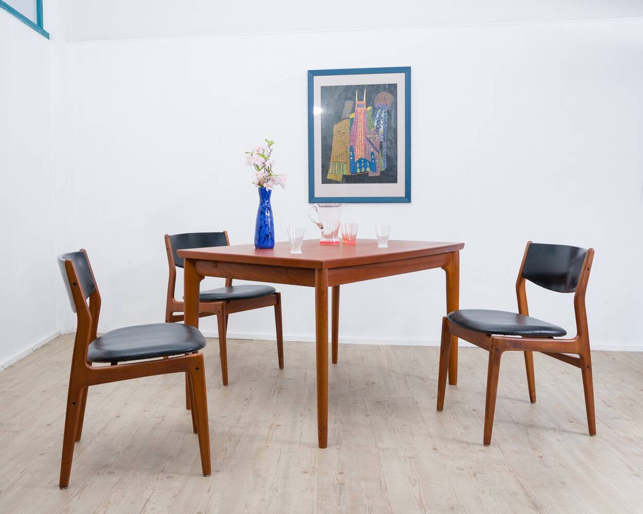 Teak dining table, made in Denmark, by the company Glos.