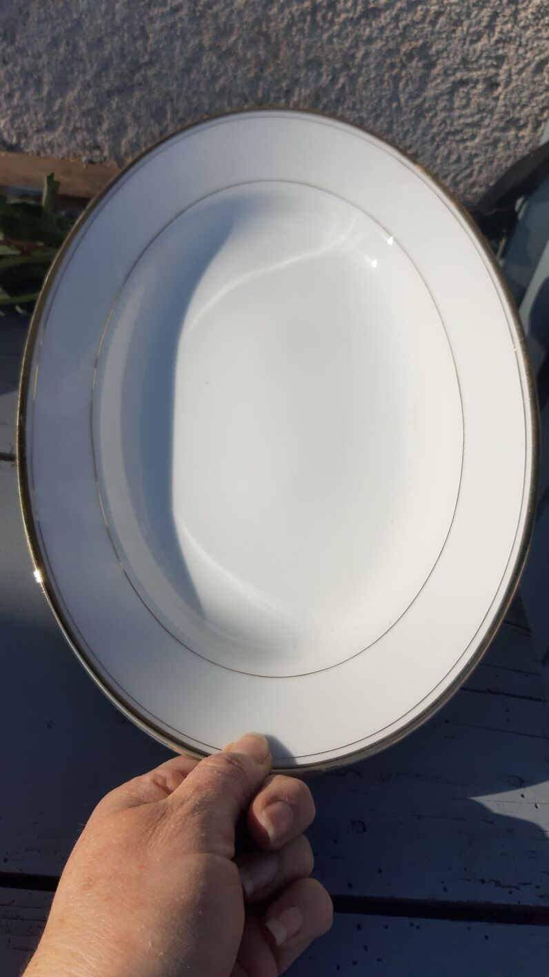former oval white and gold Limoges porcelain dish