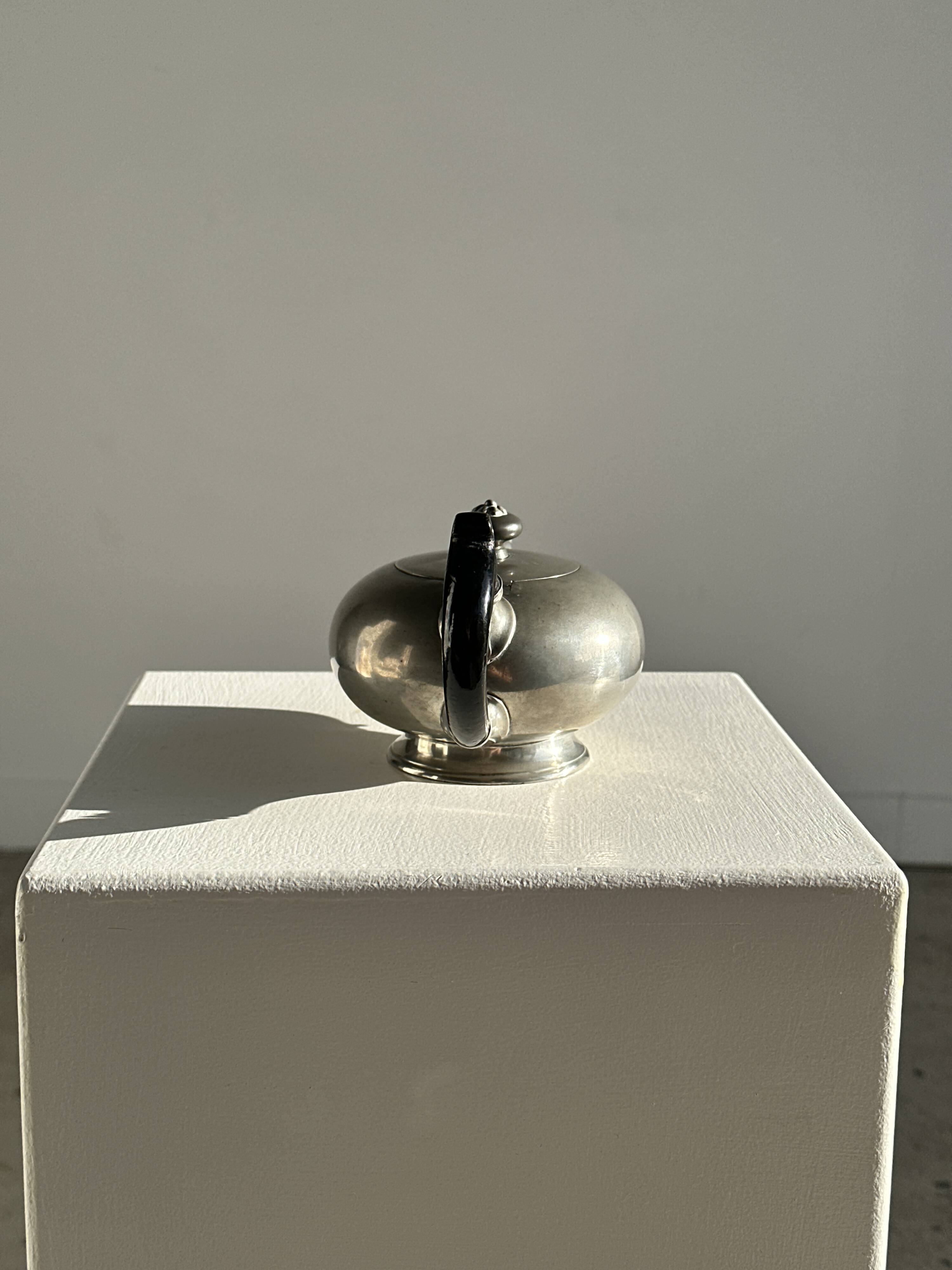 Small teapot, pewter coffee pot flattened oval shape