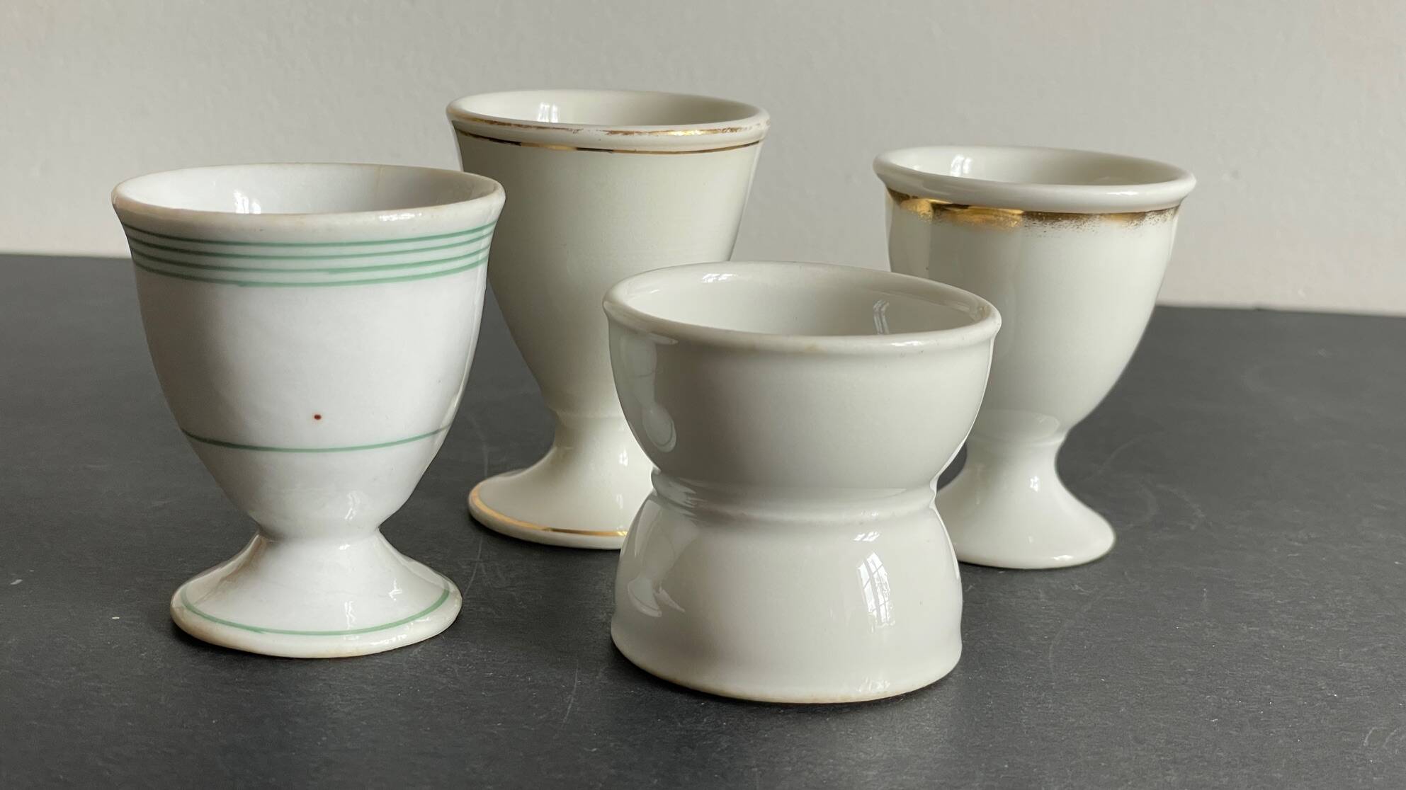 4 antique ceramic egg cups