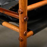 Fauteuil lounge Sirocco Safari d'Arne Norell en palissandre et cuir noir, Suède