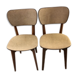 Pair of black mottled white leatherette chairs