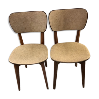 Pair of black mottled white leatherette chairs