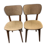 Pair of black mottled white leatherette chairs