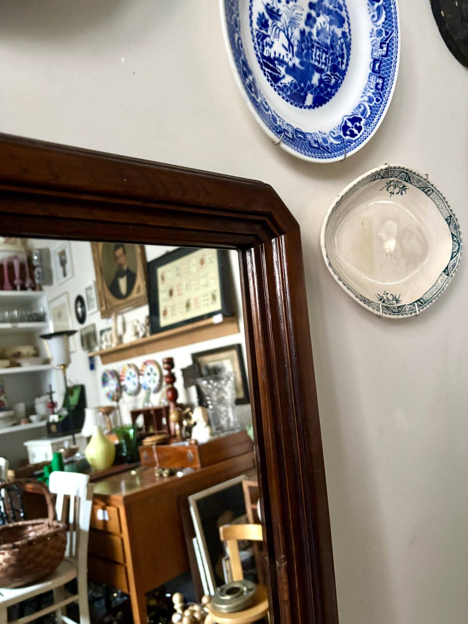 Full-length rectangular mirror in dark wood