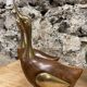 Pair of duck or swan in wood and brass sculpture