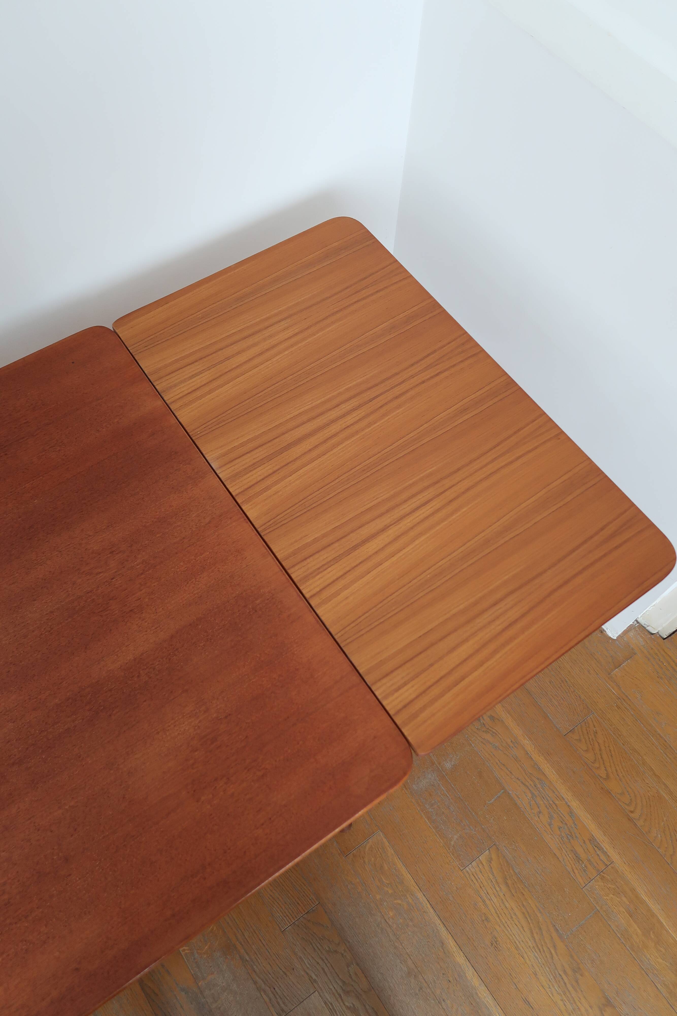 Scandinavian stretch teak table