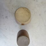 Set of two enamelled stoneware bottles.
