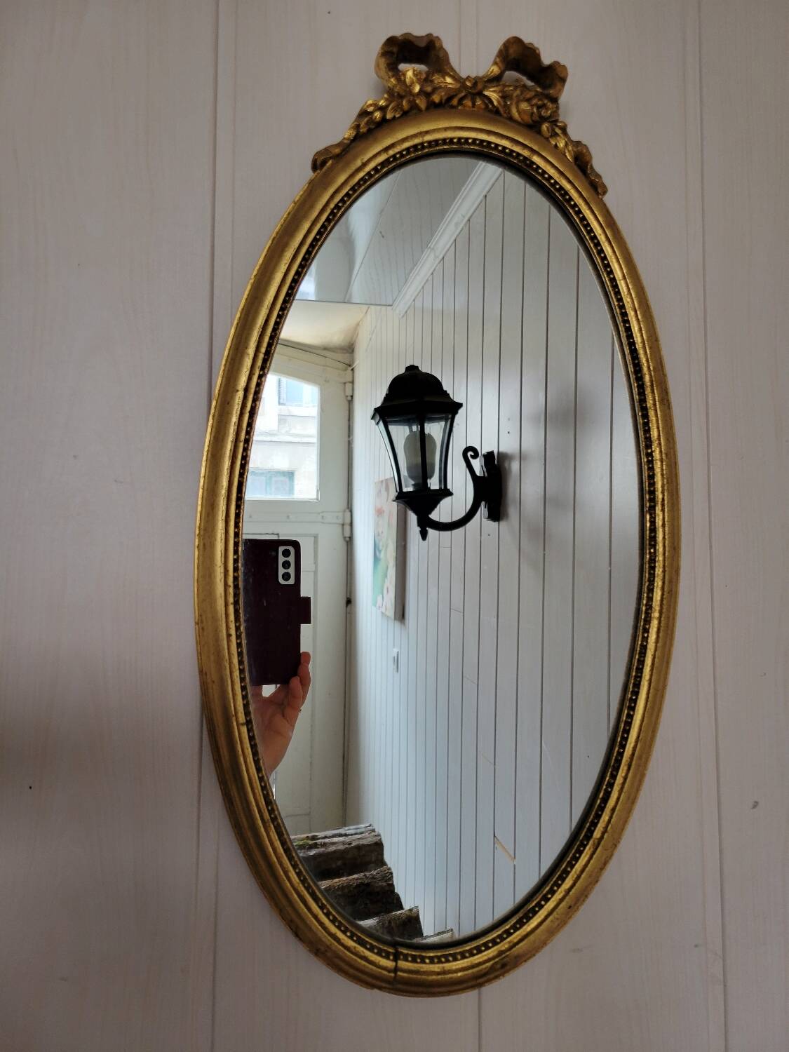 Louis XVI style oval mirror