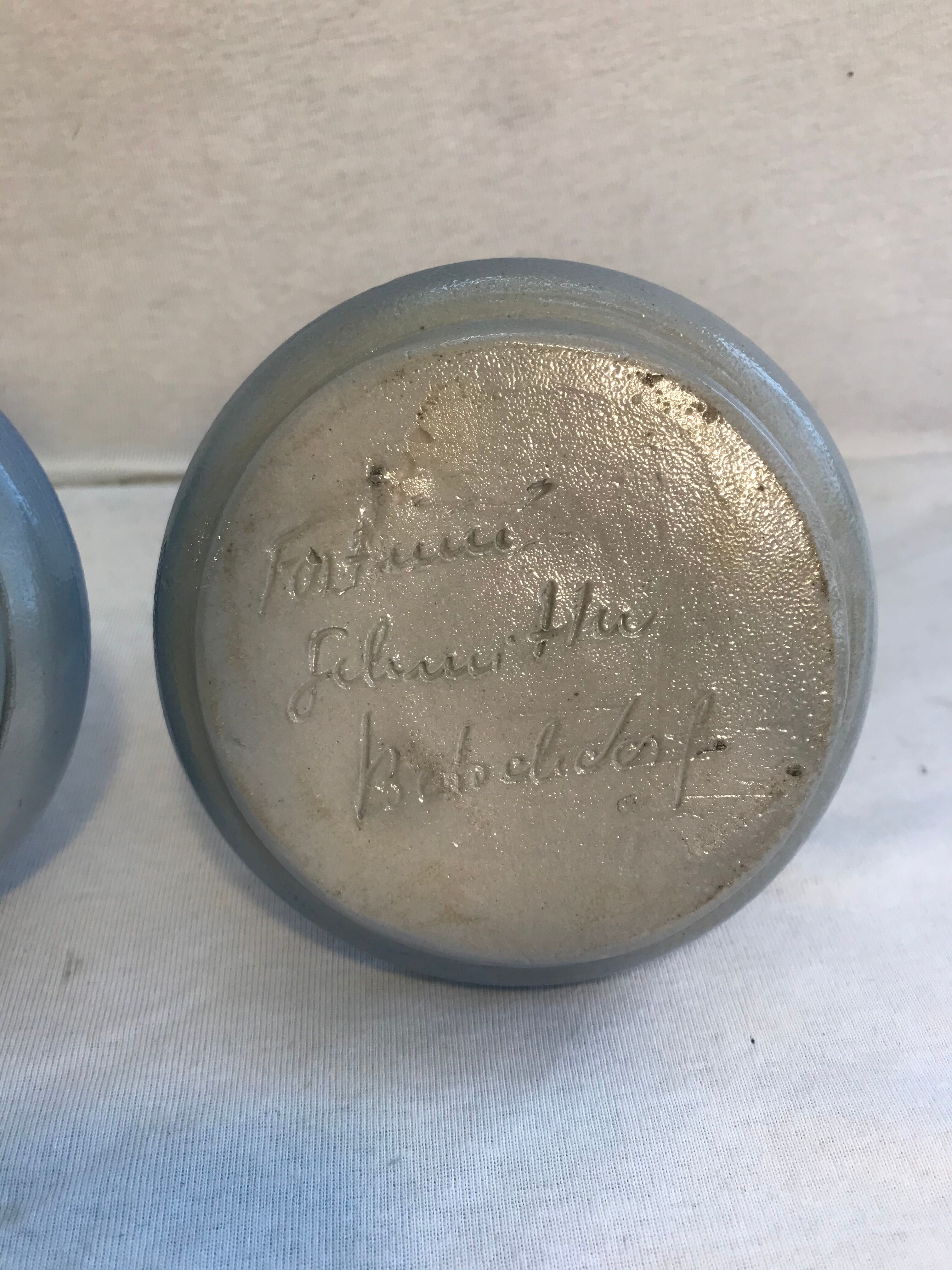 Pair of Betschdorf Schmitter ceramics bougeoirs