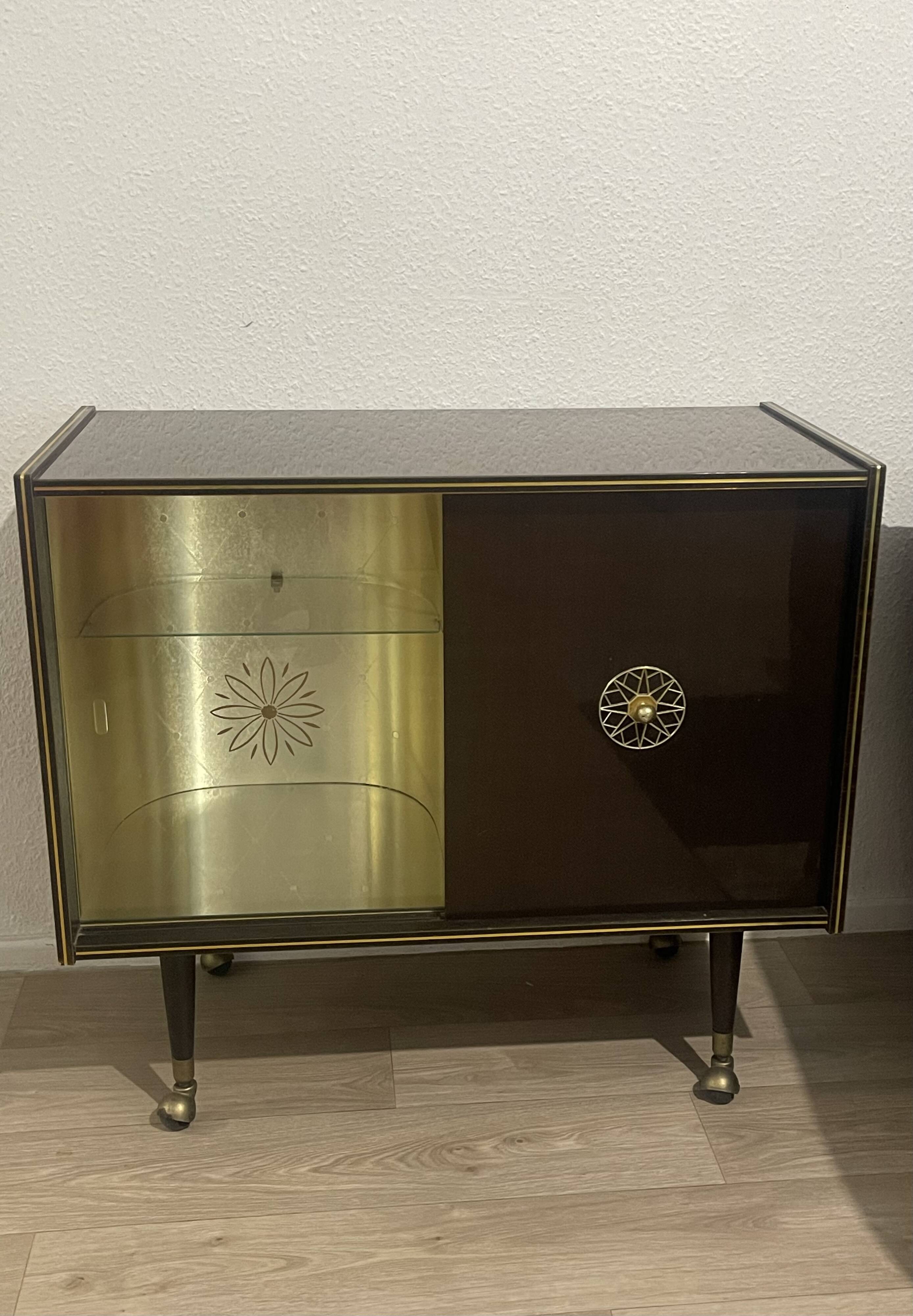 Wood and brass bar cabinet, 1950s.