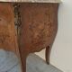 Commode style Louis XV en marqueterie et bois de rose