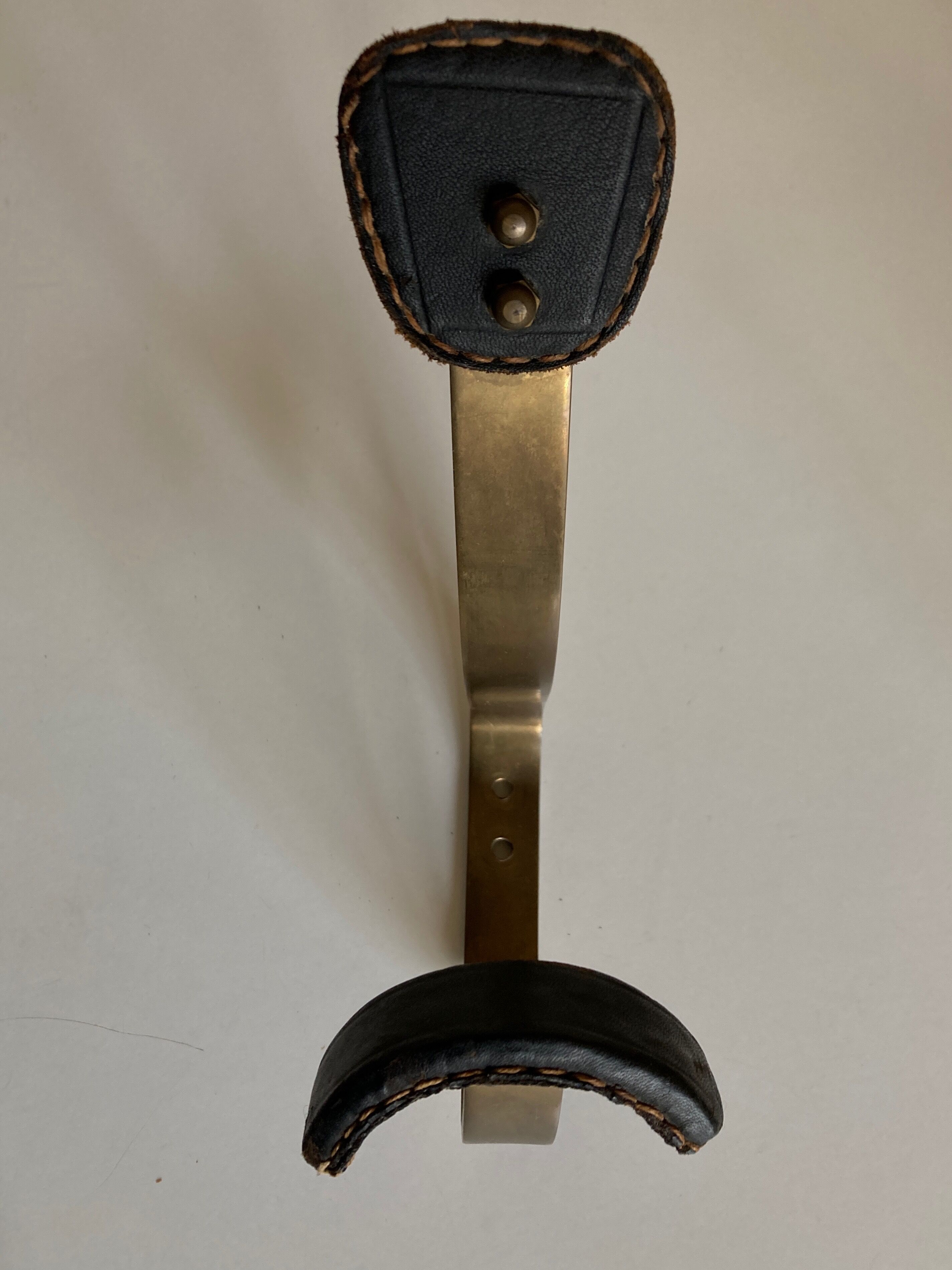 Adnet hook in bronze and leather 1950