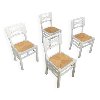 4 white chairs