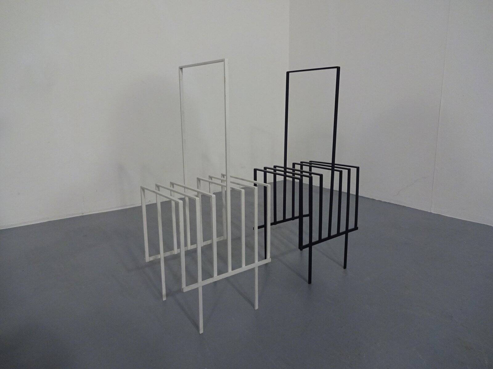 Steel magazine or record racks, 1960s, set of 2