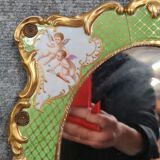 Porcelain mirror with cherub decorations circa 1900