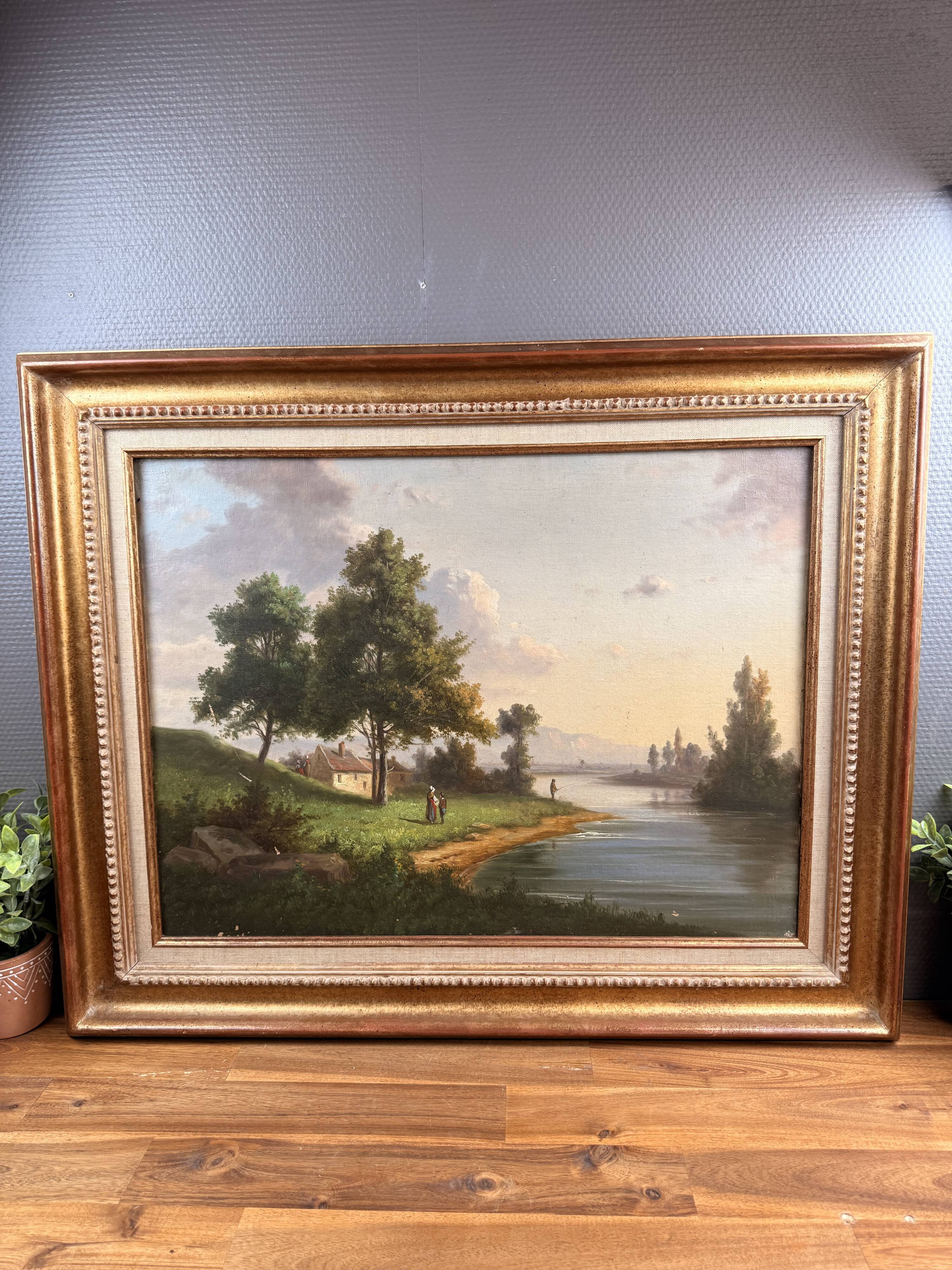 Oil on canvas landscape by the river – antique gilded frame