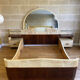 Bed with integrated bedside in rosewood and parchment, art deco period, twentieth century