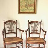 Pair of straw and cherry armchairs