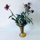 Ancient tulip vase in amber glass