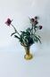 Ancient tulip vase in amber glass