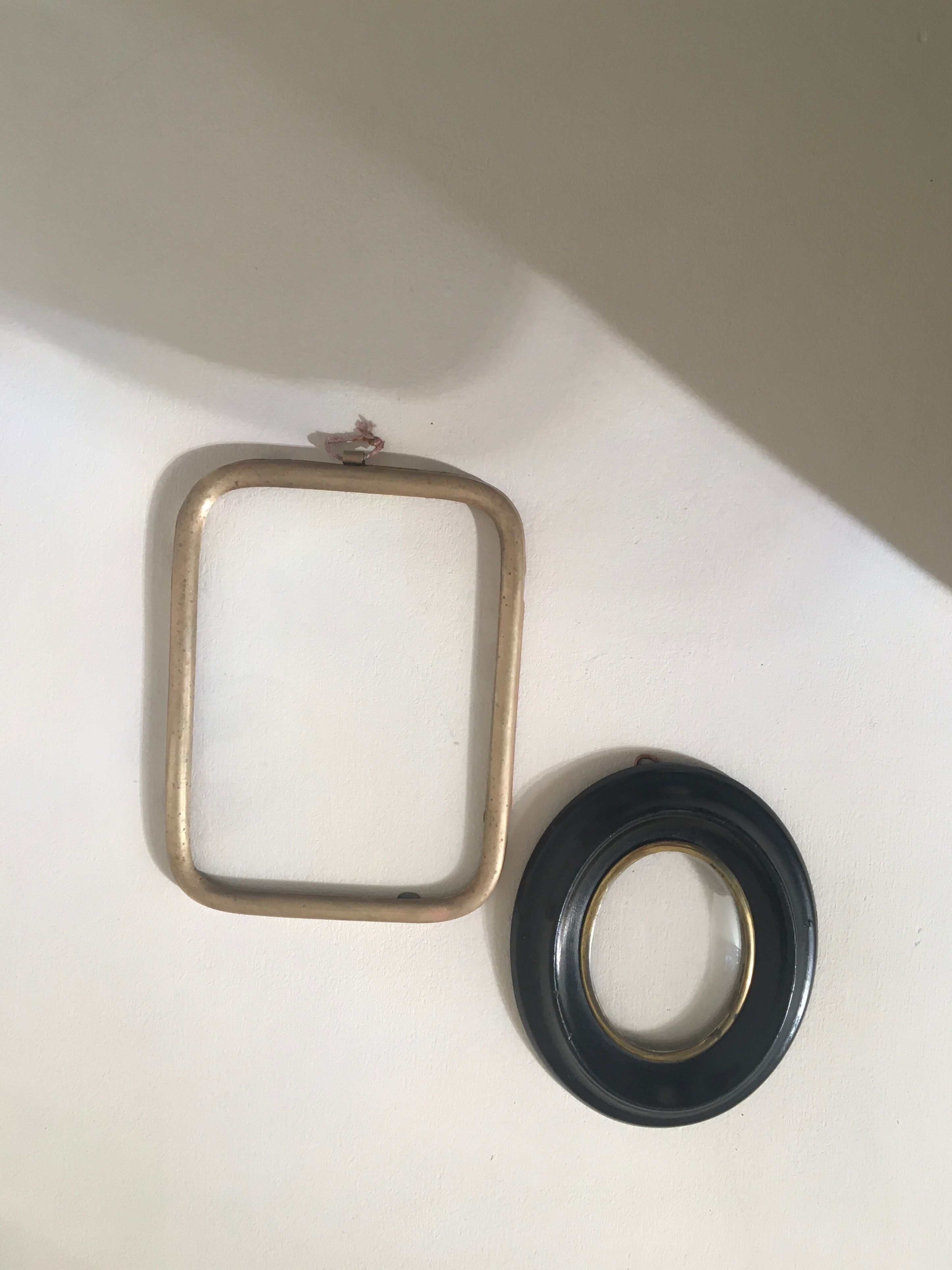 Set of wooden and brass frames with windows