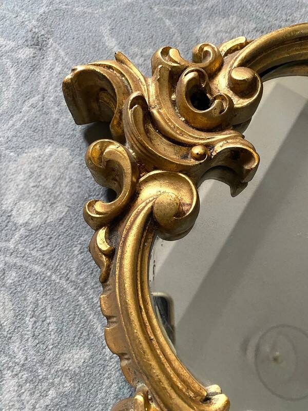 Old golden mirror in composite resin baroque style 60s