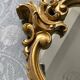 Old golden mirror in composite resin baroque style 60s