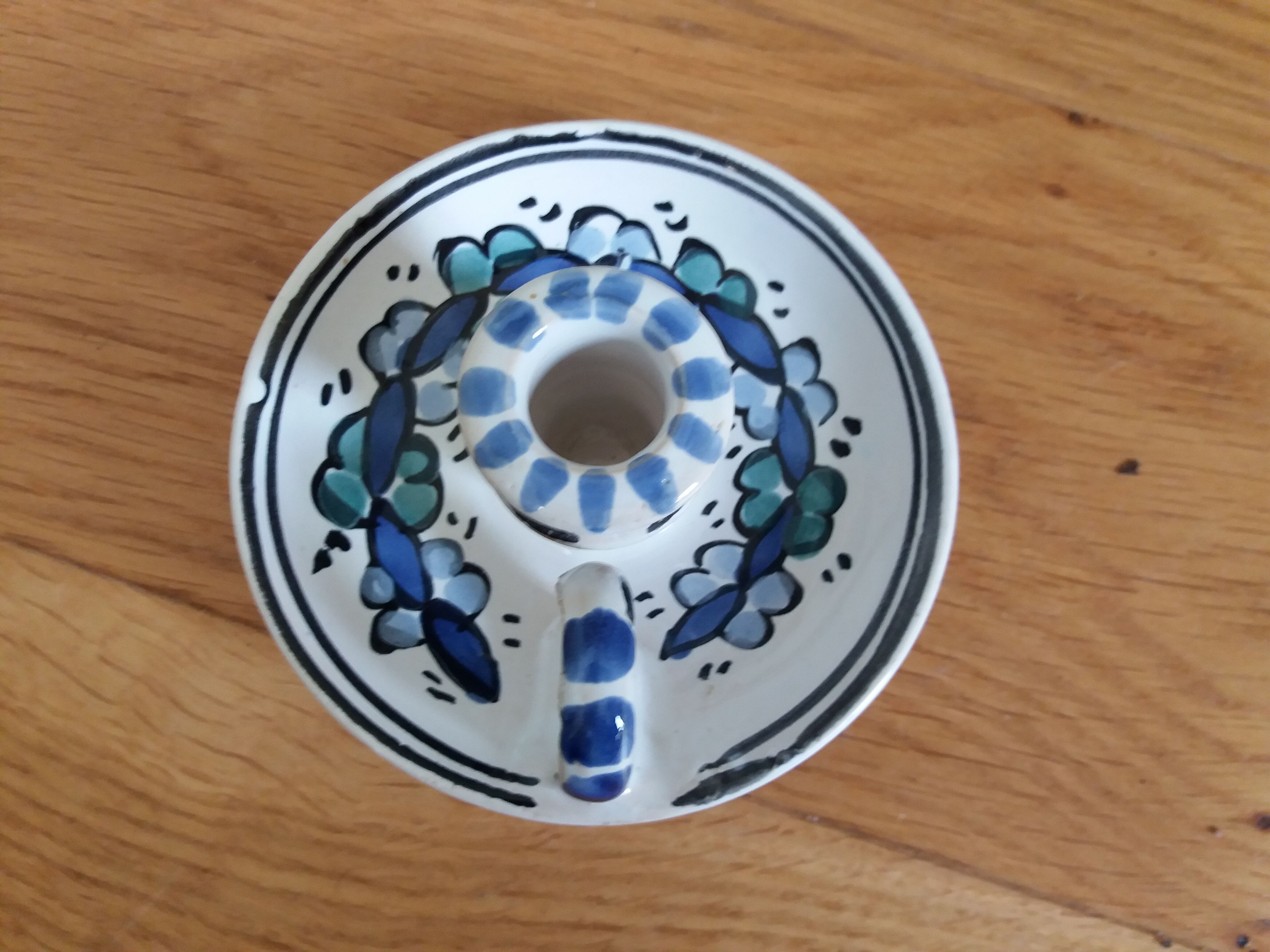 Cellar rat candle holder