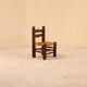 Low fireplace chair attributed to Charles Dudouyt.
