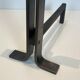 Pair of modernist and wrought iron fire dogs