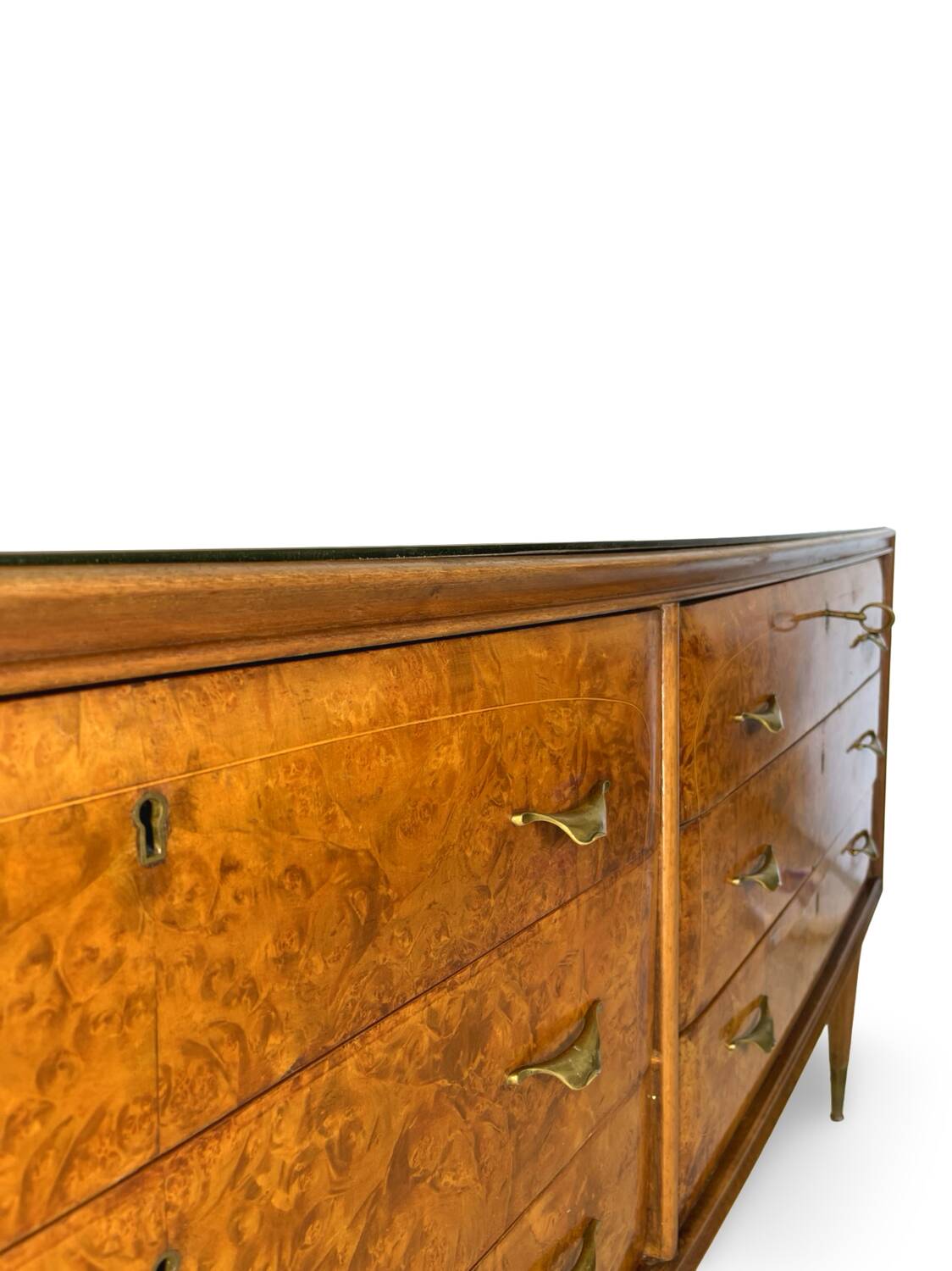 Veneered burl walnut chest of drawers with light warm brown glass top