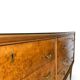 Veneered burl walnut chest of drawers with light warm brown glass top