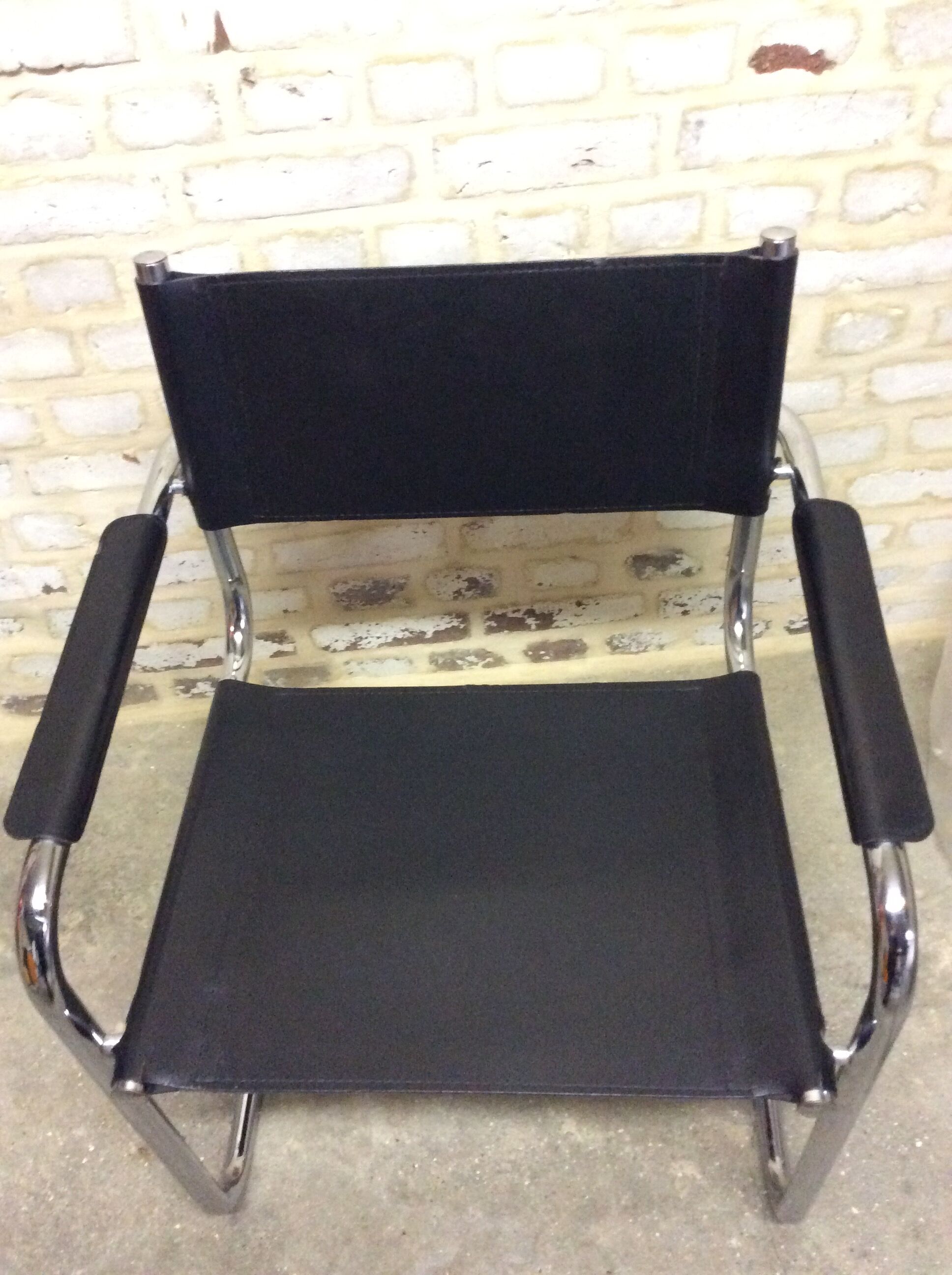 Chair leatherette and brass