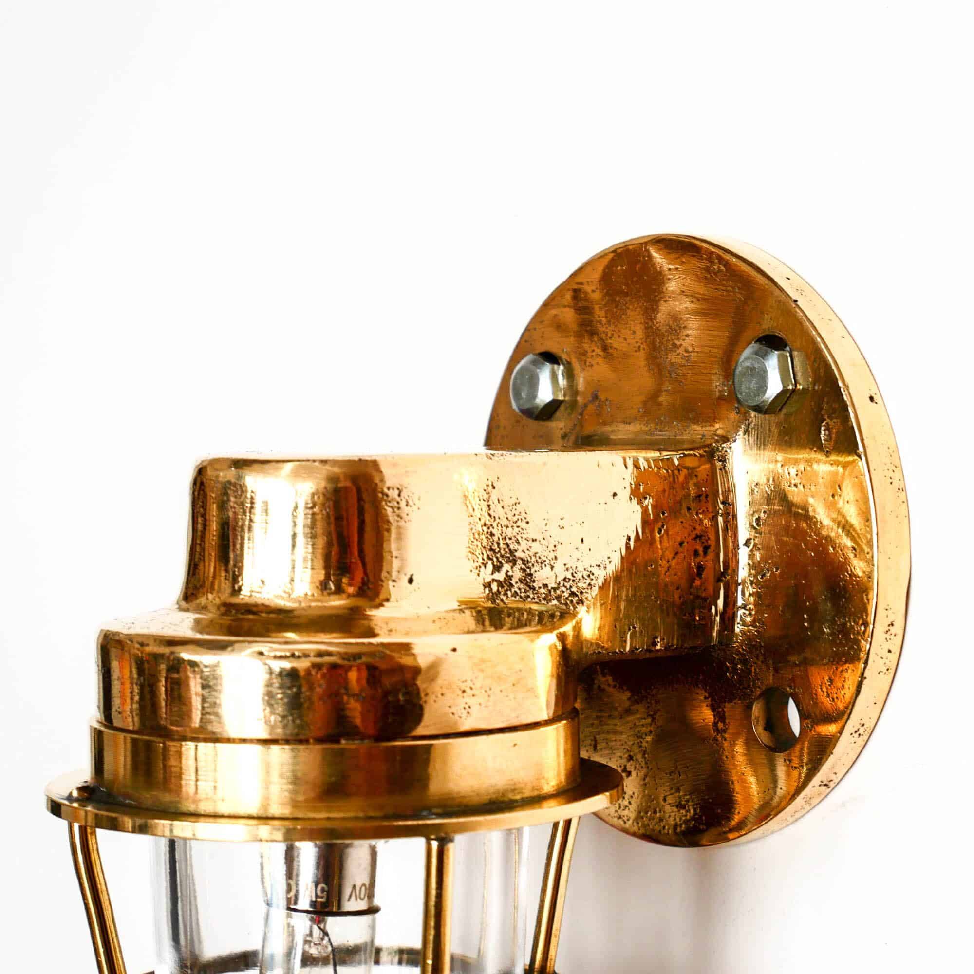 Old bronze “loupiote” wall light