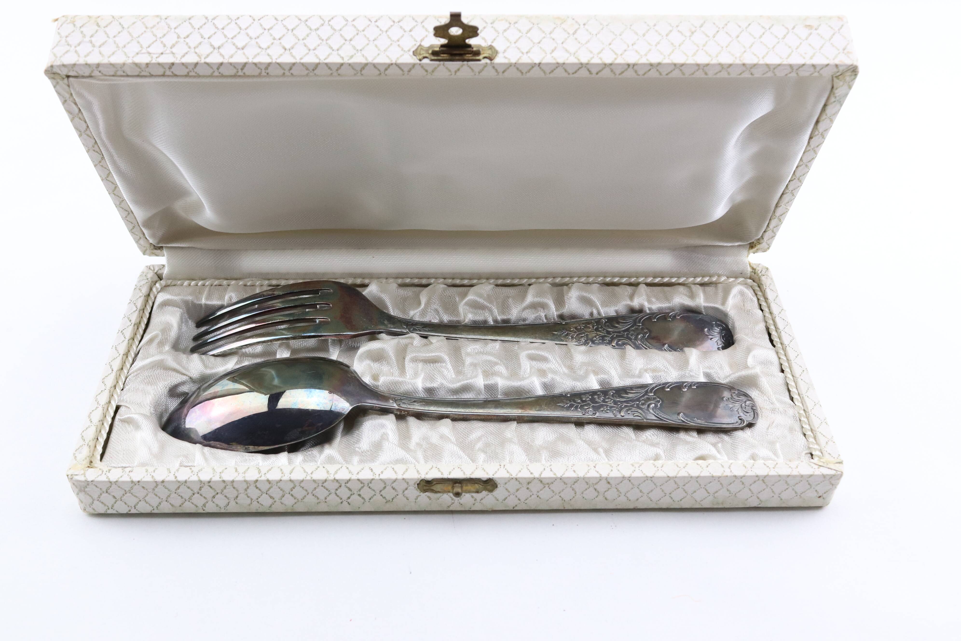 Old covered box in silver or silver metal spoon and fork with hallmarks