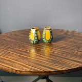 A pair of green and yellow vases